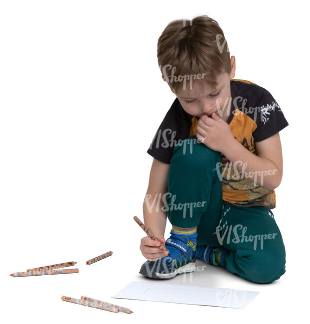 little boy drawing on the floor