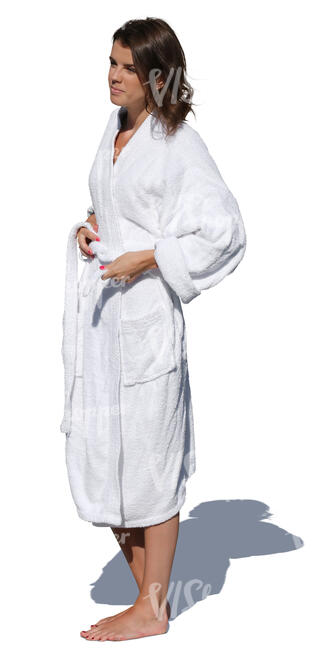 woman in a white bathrobe standing