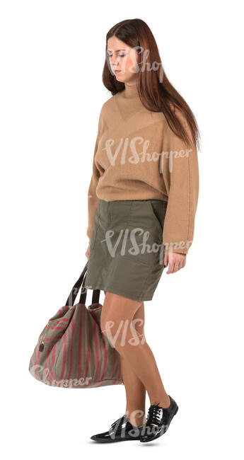 woman in a brown sweater walking