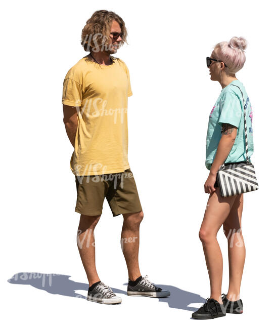 young man and woman talking on a sunny street
