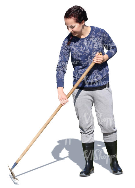 woman raking in the garden