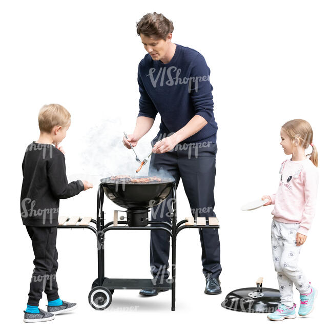 father with two kids cooking dinner on the grill