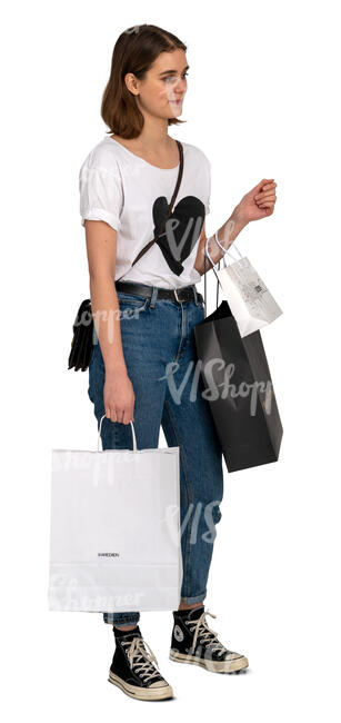 woman with many shopping bags standing