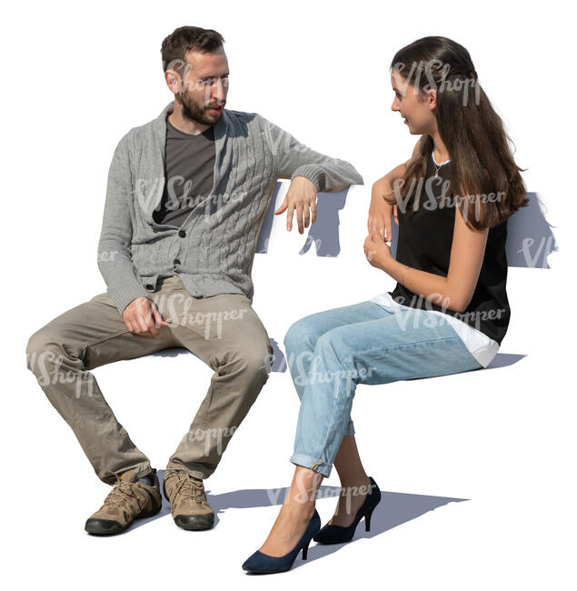 man and woman sitting outside and talking