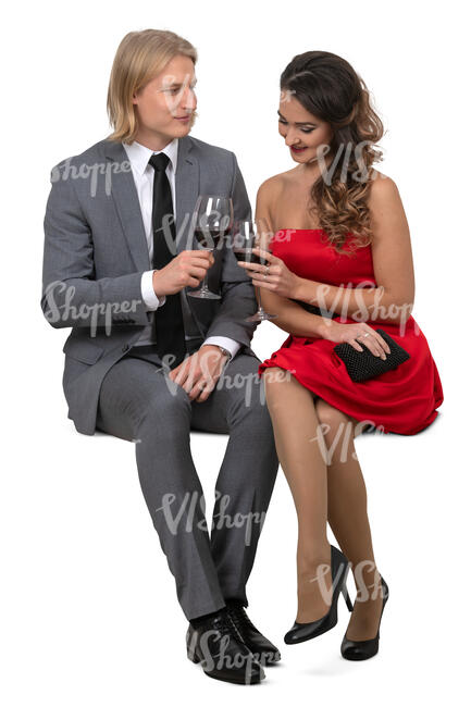 couple sitting in a restaurant and drinking wine