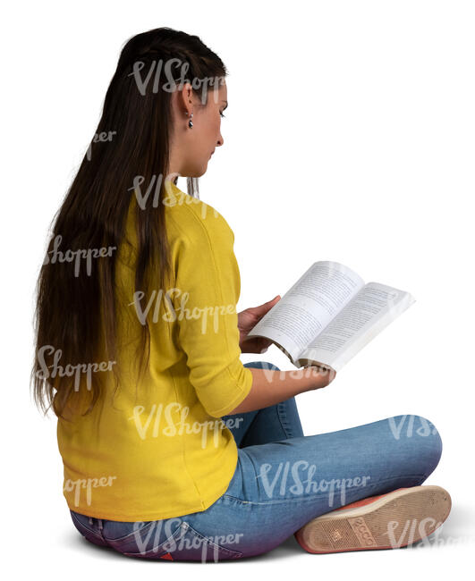 woman sitting on the floor and reading