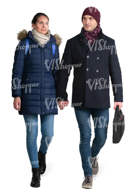 couple in winter coats walking hand in hand