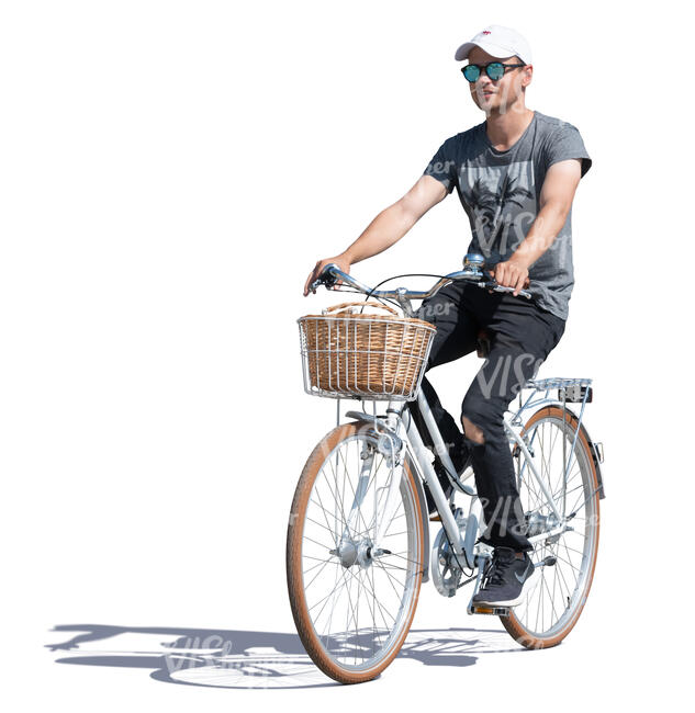 young man riding a white city bike