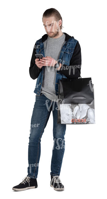 man with many shopping bags standing and checking his phone