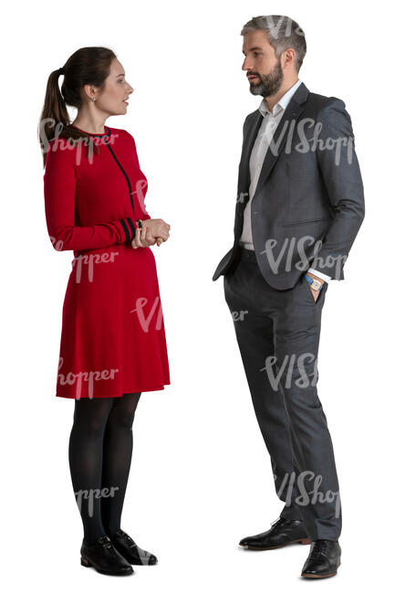 man and woman standing and talking on a formal occasion