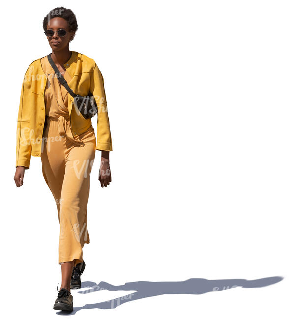 woman in a yellow costume walking