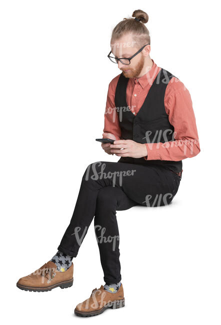 trendy young man sitting and looking at his phone