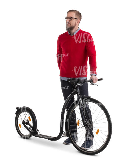 man with a kickbike standing