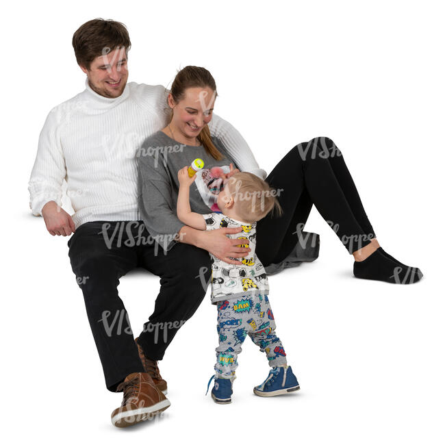 family with little son relaxing on a sofa