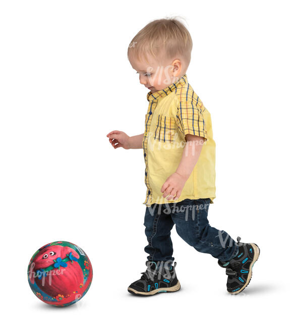 little boy playing with a ball