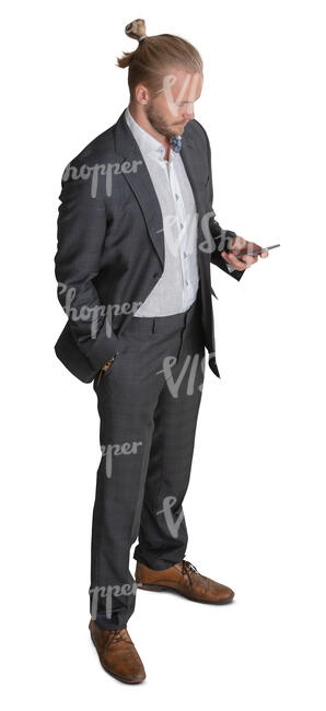 young businessman with a phone in his hand seen from above