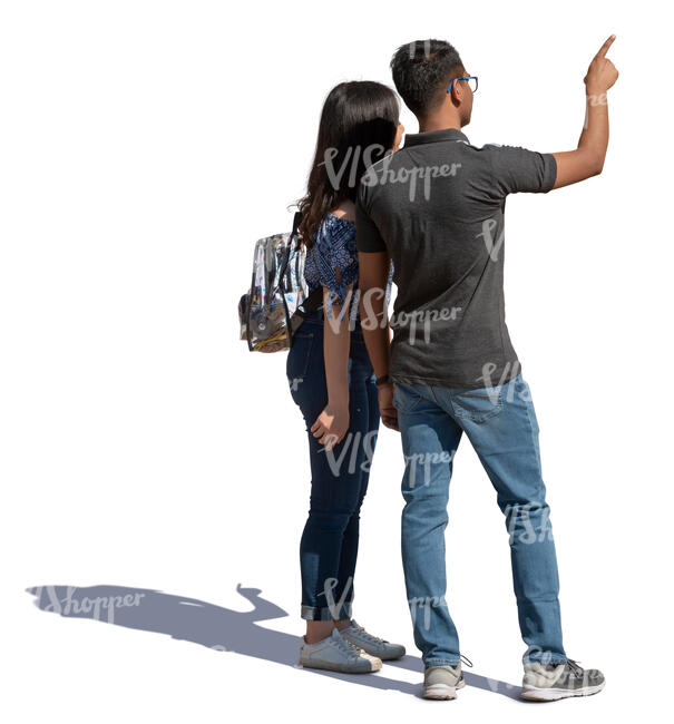 two students standing and pointing at smth