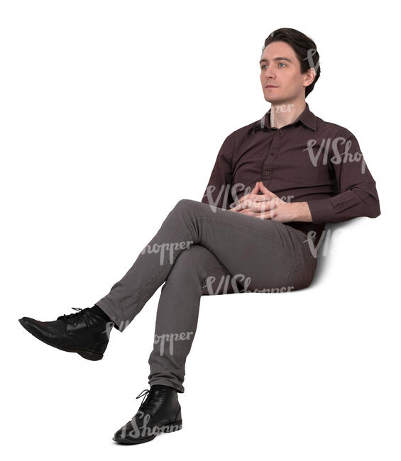 man sitting and looking into distance