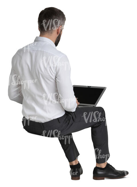 businessman sitting with a laptop on his knees