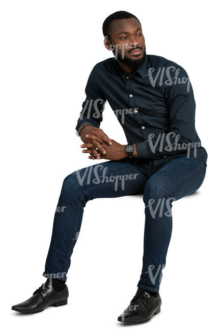 man sitting casually and leaning on a table