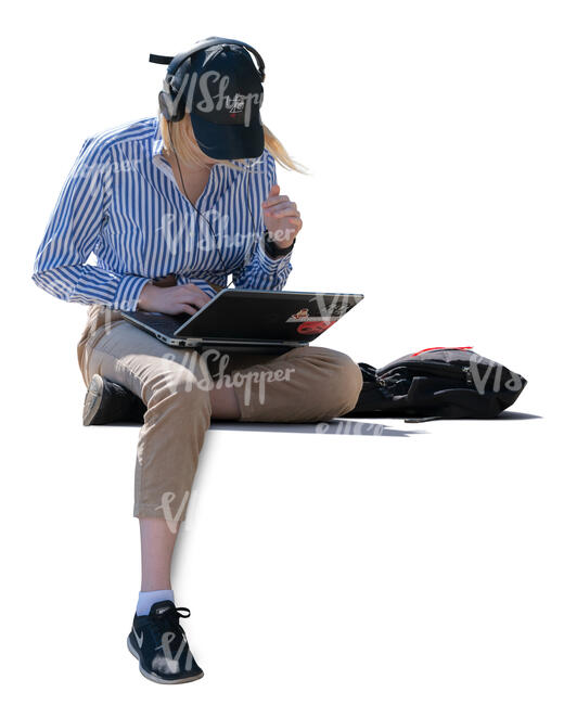 woman with laptop and headphones sitting