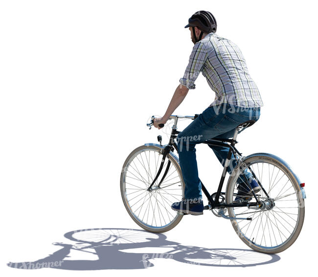 backlit man riding a bike