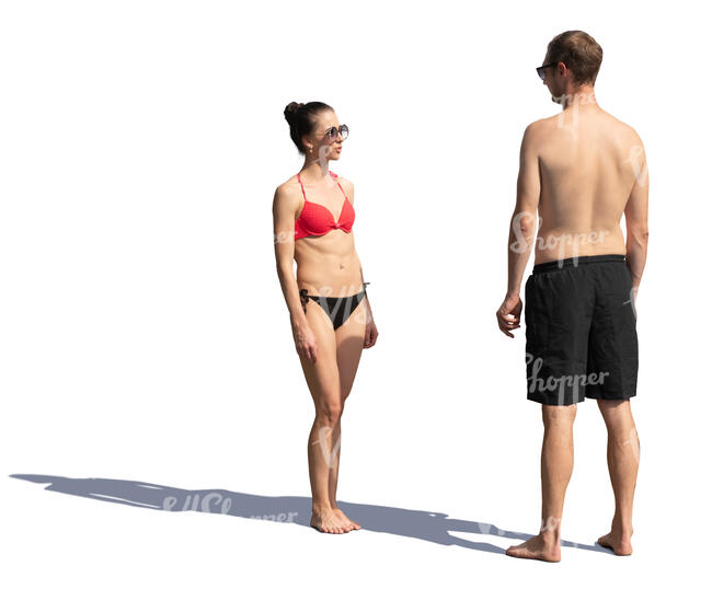 man and woman standing at the beach and talking