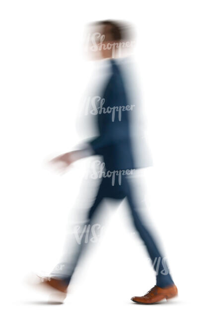 motion blur image of a man in a suit walking