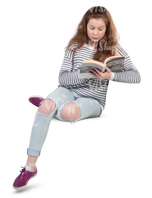 teenage girl sitting and reading a book