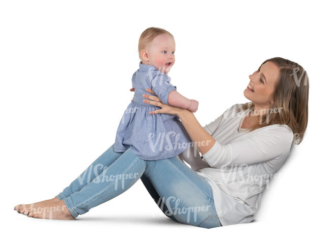woman sitting on a sofa and playing with her baby girl