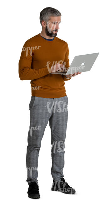 man standing and holding a laptop 