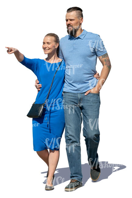 man and woman walking and pointing at smth