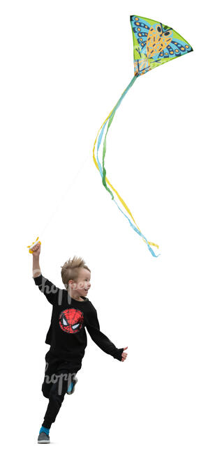 little boy running and flying a kite