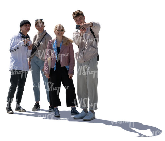 backlit group of young people taking a selfie 