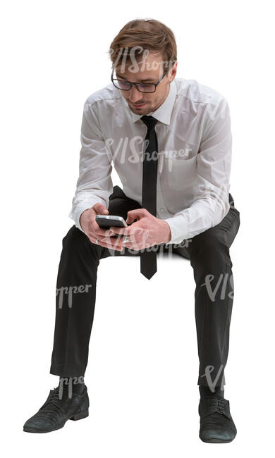 cut out businessman sitting and browsing his phone