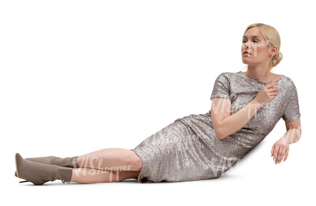 cut out woman in a glittering cocktail dress lying on a sofa