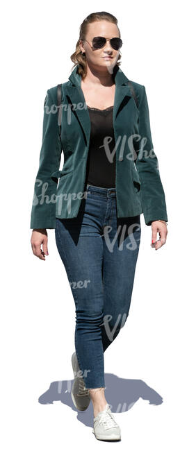 cut out woman in a green jacket walking