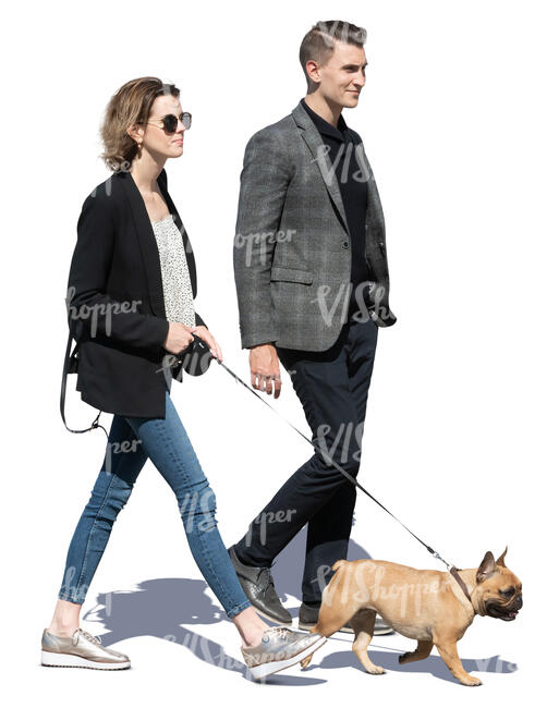 man and woman with a dog walking