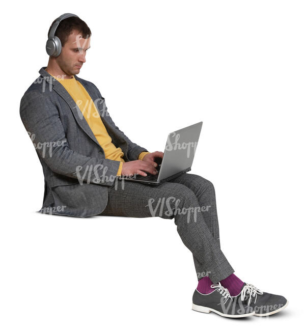 cut out man with headphones and a laptop sitting