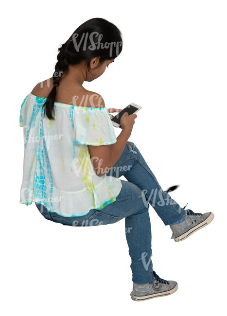 cut out indian woman sitting and checking her phone