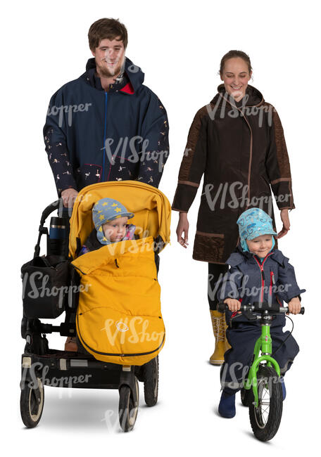 cut out family with two kids walking on a autumn day