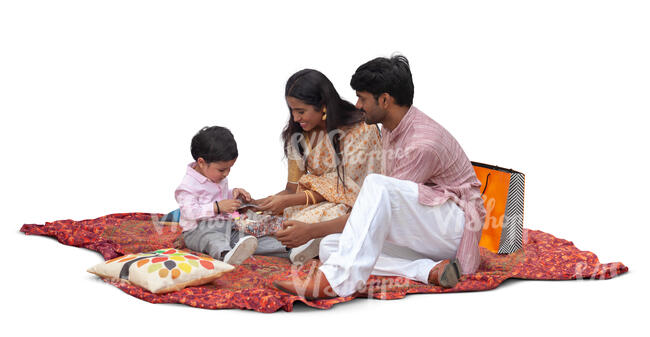 cut out indian family having a picnic