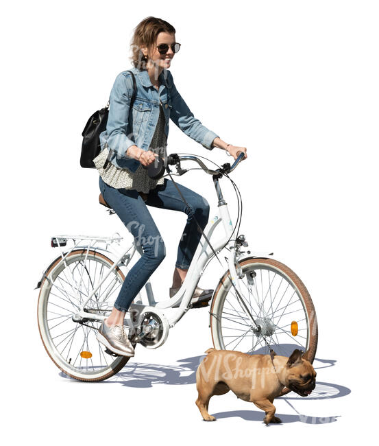 cut out woman riding a bike with a dog running beside her