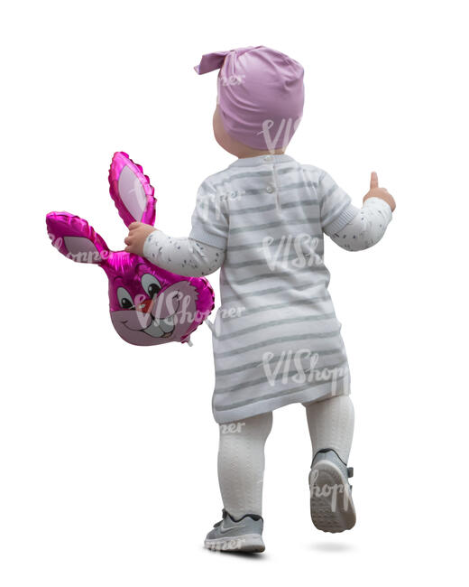 cut out toddler with a toy in her hand walking