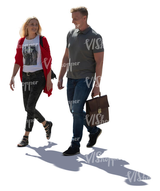 cut out backlit man and woman walking on the street and talking