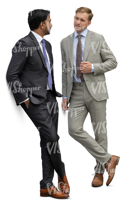 two businessmen standing and leaning against the wall and talking