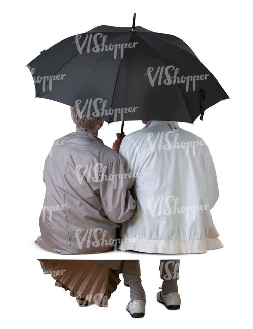 cut out elderly couple sitting under an umbrella