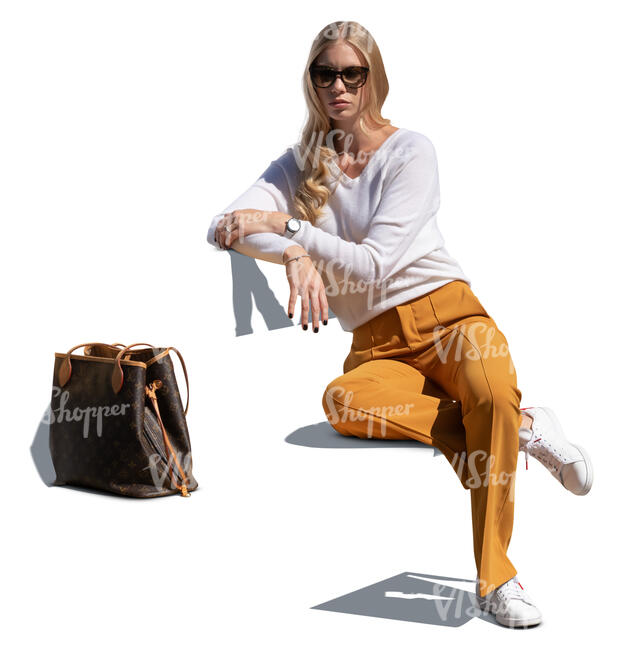 cut out woman sitting on a bench and leaning against the backrest