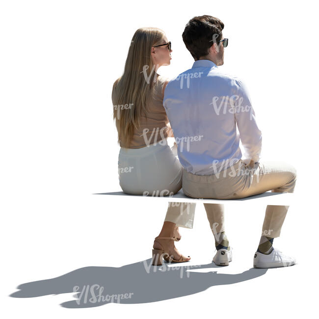 cut out backlit man and woman sitting seen from back angle