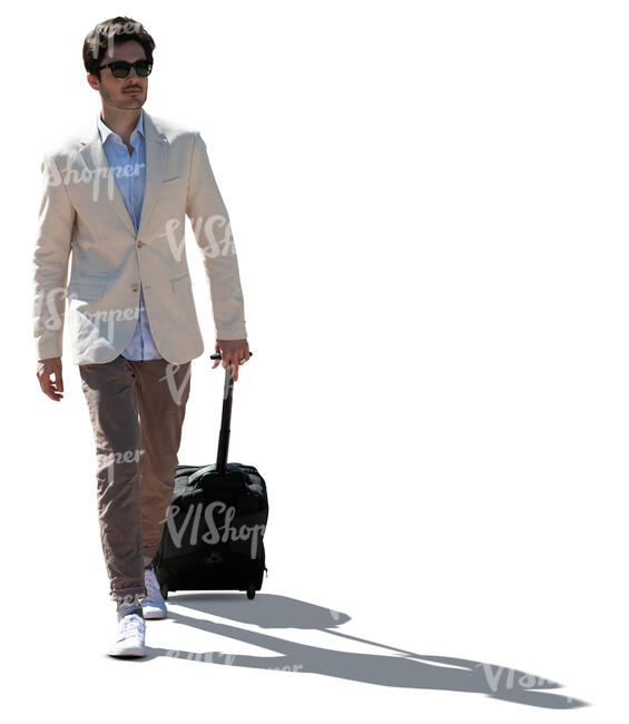 cut out backlit young man with a suitcase walking